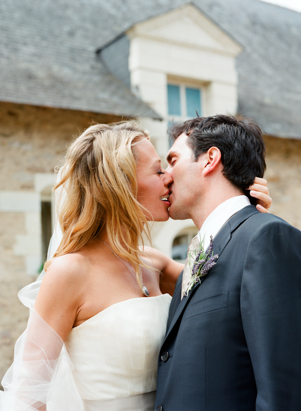 kissing bride and groom wedding photo by Elizabeth Messina Photography